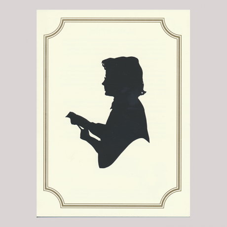 
        Silhouette, with woman looking left, wearing glasses.
